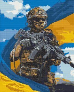 Купити Набір для алмазної мозаїки 40х50 см. Патріотична картина Воїн ЗСУ з прапором (на підрамнику, круглими камінчиками)  в Україні